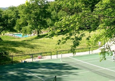 Looking down the valley showing the tennis court and swimming pool in the distance